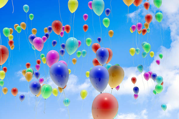 istock Colorful Balloons are Flying On Blue Sky 519045694