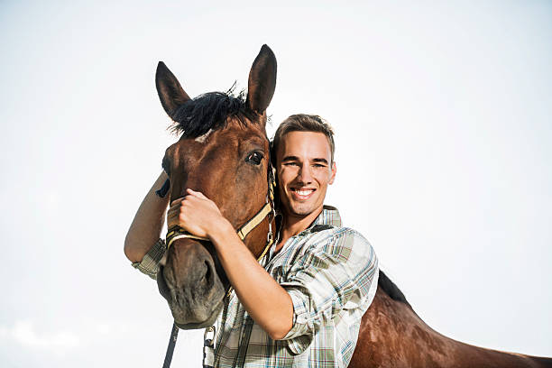 istock Man with horse against the sky. 519047493