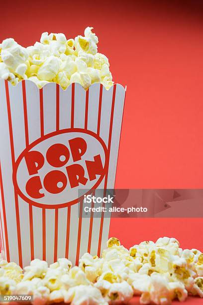 Classic Box Cinema Popcorn On Yellow Background Stock Photo - Download Image Now - Arts Culture and Entertainment, Bag, Box - Container
