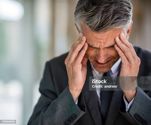 Business Man With A Headache Stock Photo - Download Image Now - Adult, Adults Only, Anxiety