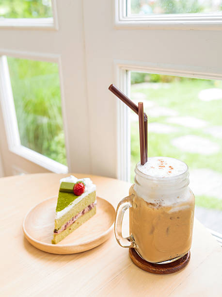 istock Ice coffee with japanese matcha green tea cake 519048282
