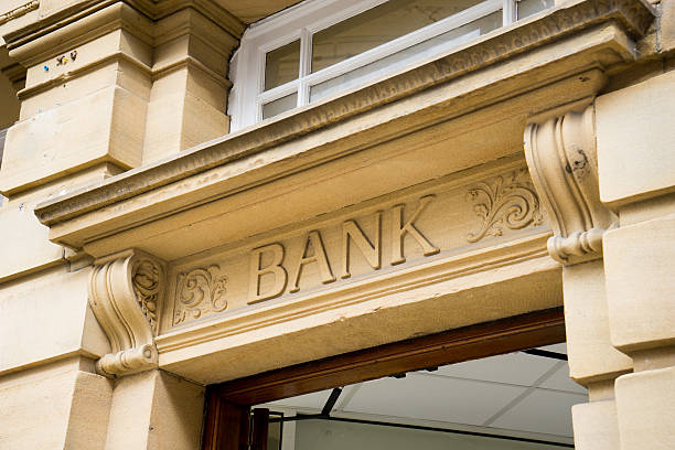 istock Bank Sign logo entrance, Stone Background 519049399