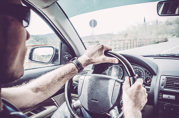 istock Portrait of a Man driving his Car 519050544
