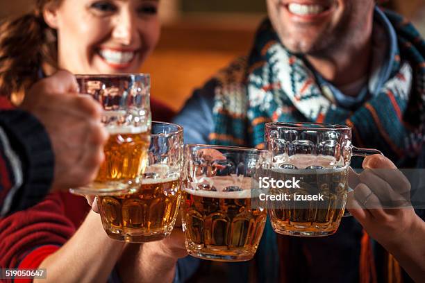 Friends Toasting With Beer Stock Photo - Download Image Now - Beer - Alcohol, Apres-Ski, Winter