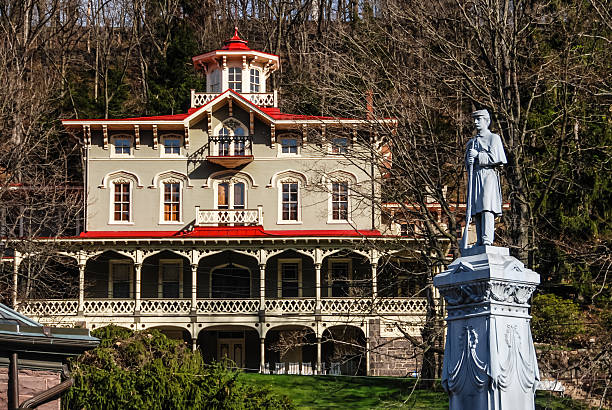 Asa Packer Mansion. This italianate Mansion, overlooking the downtown, was the home of the pioneer industrialist, Asa Packer. A National Historic landmark. Soliders and Sailors Monument in the foreground dedicated in 1886.
