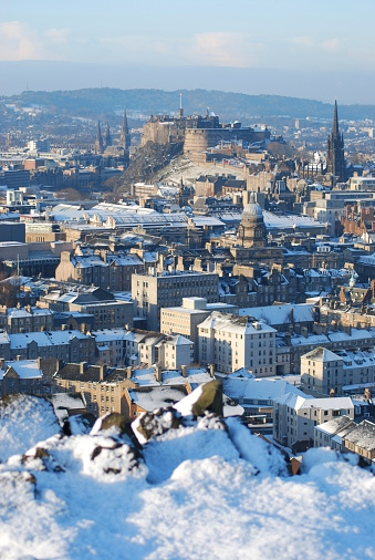 Snow covered rooftops leading to Edinburgh Castle