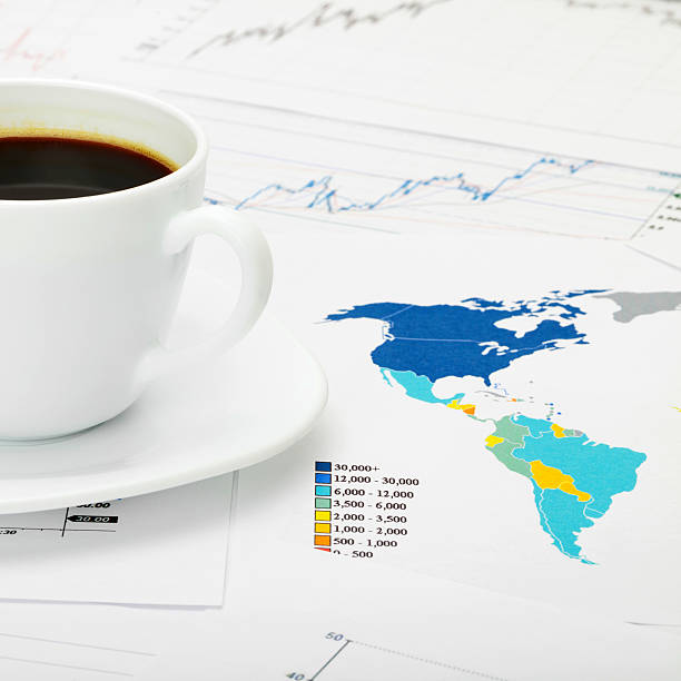 istock Coffee cup over world map - 1 to 1 ratio 519050839
