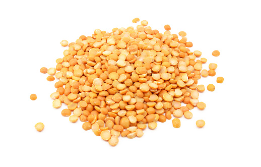 Yellow split peas, isolated on a white background