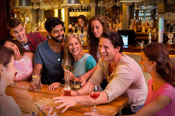 istock Friends Socialising at the Bar 519051253