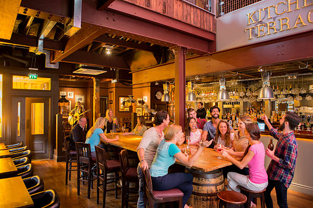 istock Friends Socialising in a Bar 519051259