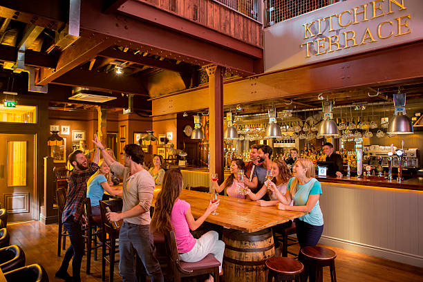 istock Friends Greeting Eachother in a Bar 519051263