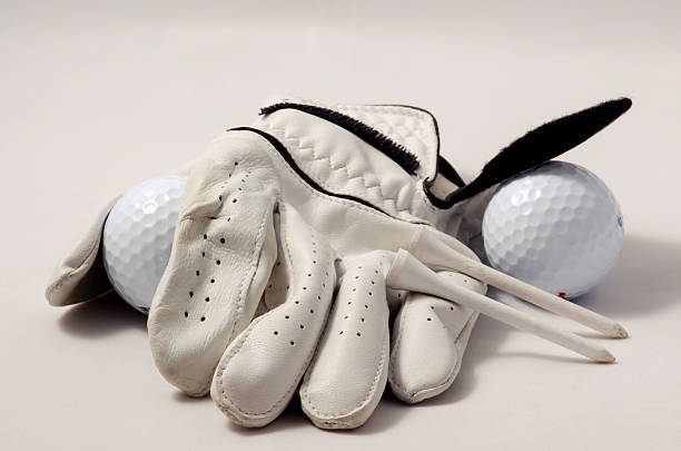 Golf glove with tees and golf balls