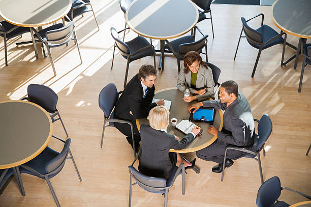 istock Businesspeople meeting over coffee 519078640