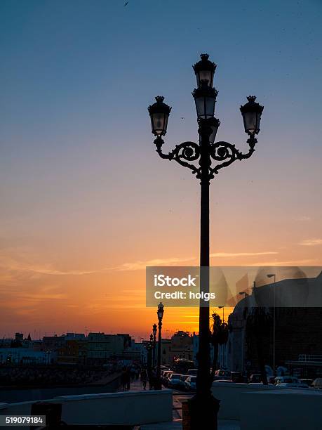 Sunset Over Cadiz Spain Stock Photo - Download Image Now - Back Lit, Building Exterior, Built Structure