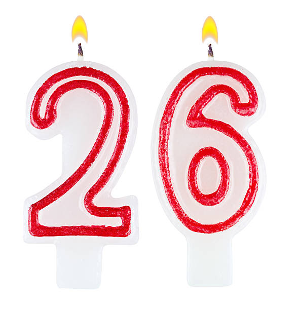 istock Birthday candles number twenty six isolated on white background 519079811