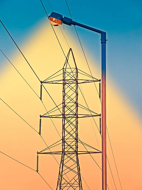 istock High voltage electricity cable, lines & masts transmission tower 519079821