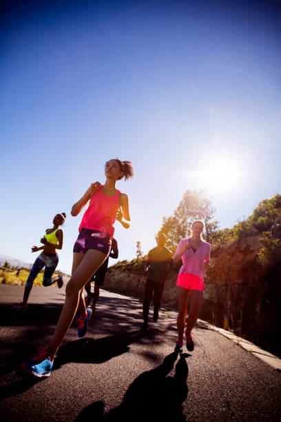 istock Group of athletes jogging outdoors 519080822