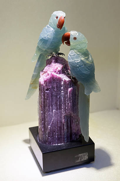 Hangzhou, China - December 2, 2014: Parrots made of green jade, traditional Chinese artistic stone carving
