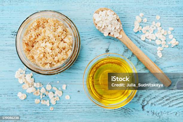 Body Scrub Of Oatmeal Sugar Honey And Oil Top View Stock Photo - Download Image Now
