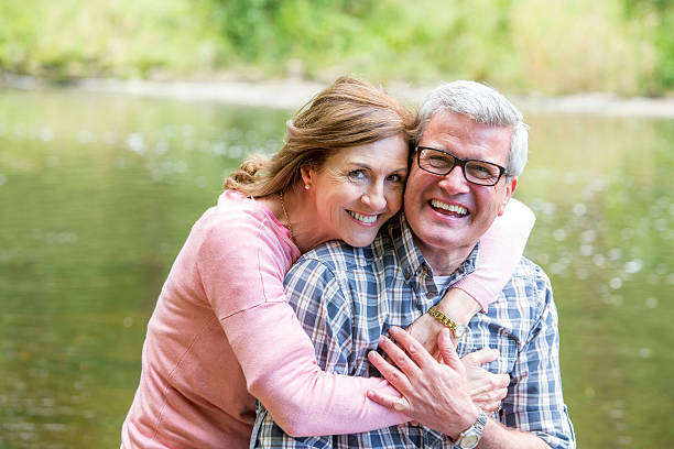 istock Elderly couple cuddling 519086760