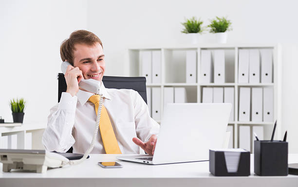 istock Businessman speaking on phone 519086828