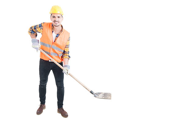 istock Happy engineer holding a shovel as digging concept 519086918