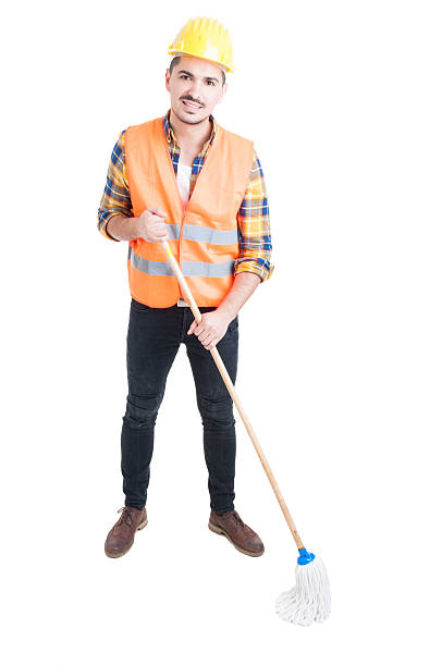istock Young constructor with mop being ready to clean the floor 519086968