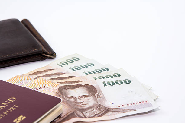istock Thailand passport and Thai maney And old wallet. 519087794