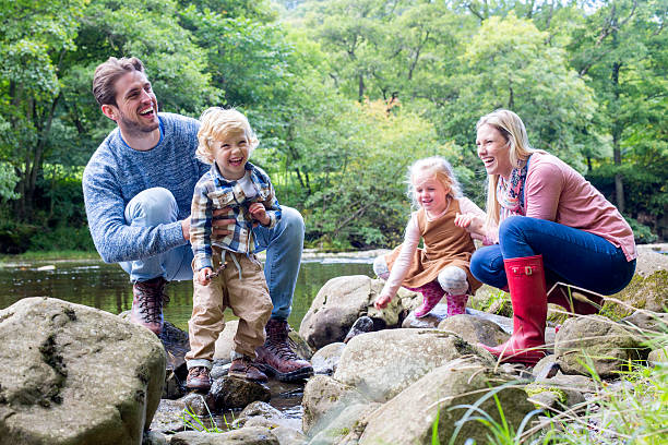 istock Family playing on the rocks 519088226