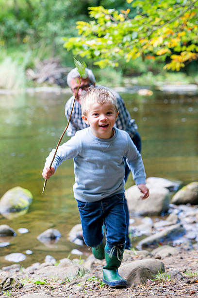 istock Little boy playing outdoors 519089474