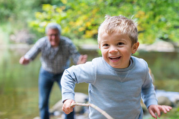 istock Little boy playing outdoors 519089530