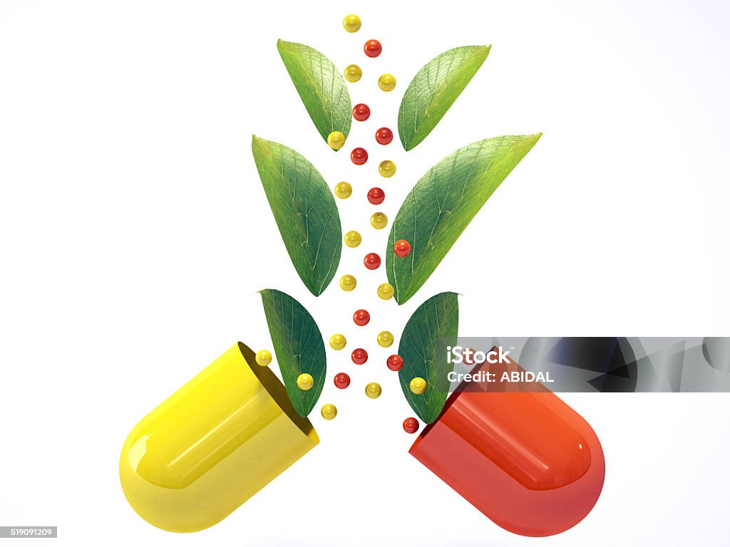 capsules with green Leaves. capsules with green Leaves isolated Alternative Medicine Stock Photo