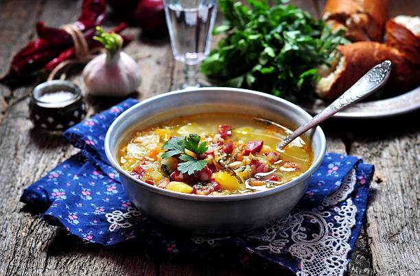istock Vegetable soup with smoked sausage. Rustic style. 519092124