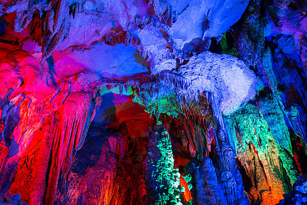 istock Beautiful illuminated multicolored stalactites from  Guilin Guangxi Yangshuo China 519106433