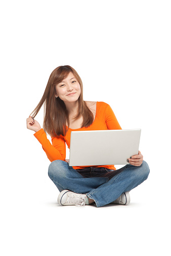 Young woman using a laptop computer