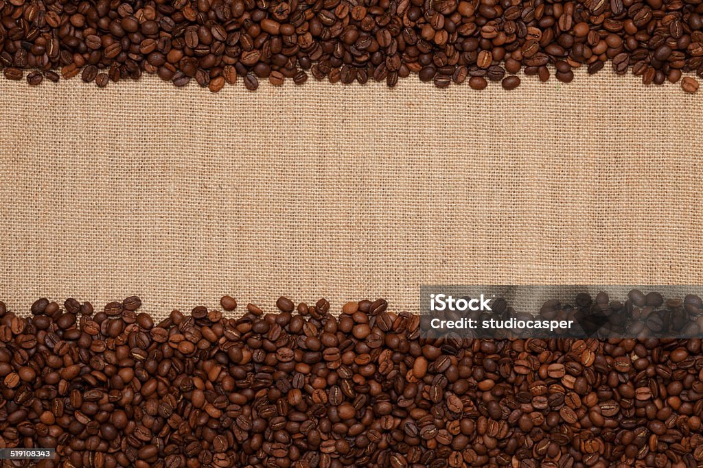 Coffee frame Coffee beans  on a  jute background other Coffee and tea image Roasted Coffee Bean Stock Photo