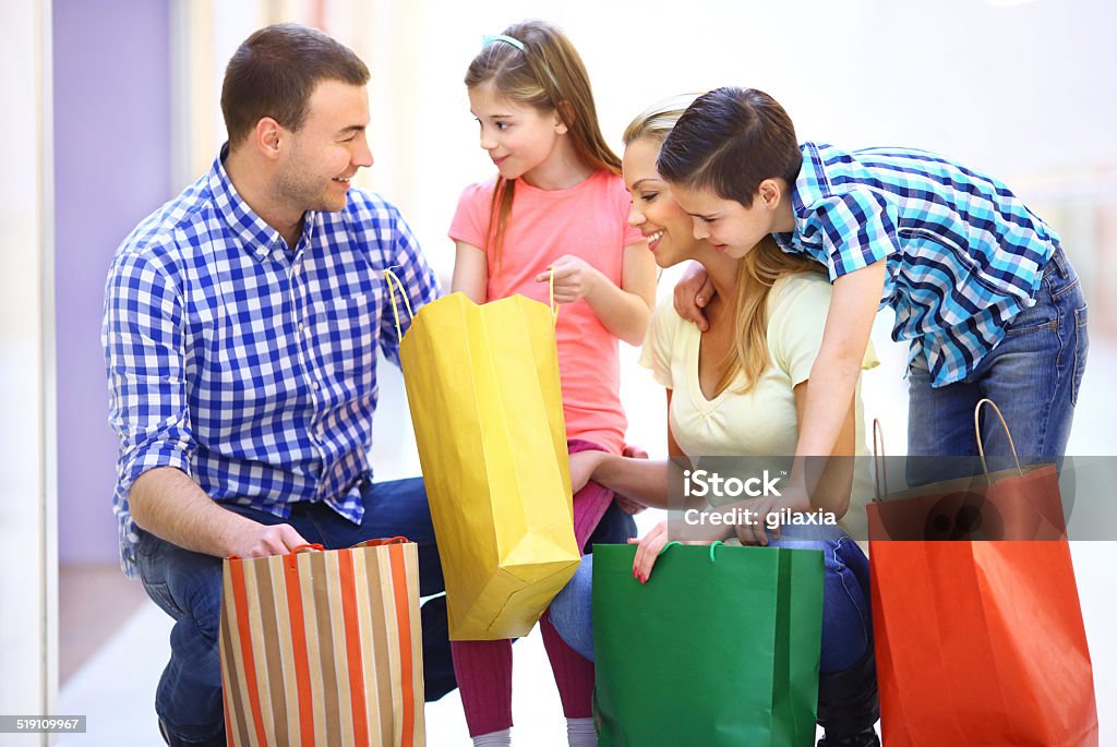 Family in shopping. Happy family in shopping mall 30-39 Years Stock Photo