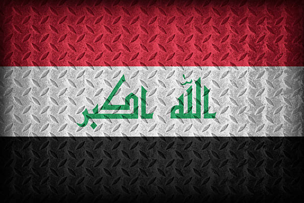 istock Iraq flag pattern on the diamond metal plate texture 519111103