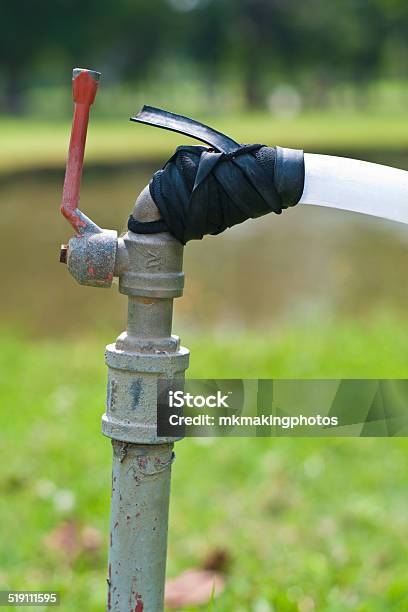 Faucet And The Rubber Tube With The Black Rubber String Stock Photo - Download Image Now