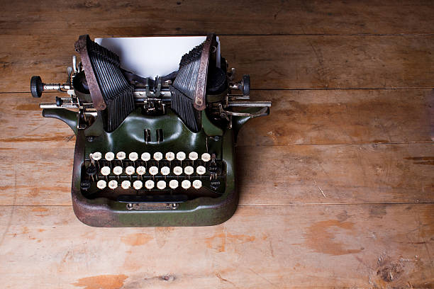 istock Top view of an old typewriter on a wooden table 519111967