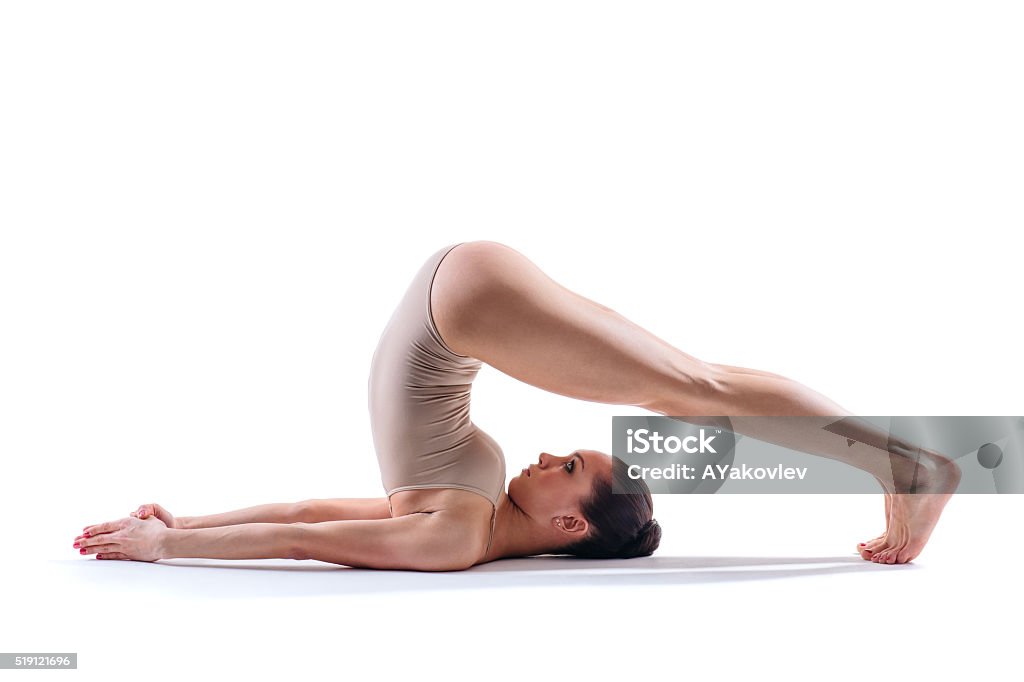 yoga woman young beautiful yoga female posing on a studio background Active Lifestyle Stock Photo