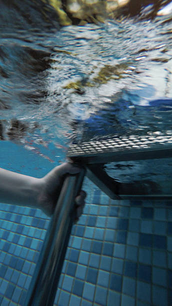 istock underwater boy in a swimming pool 519122436