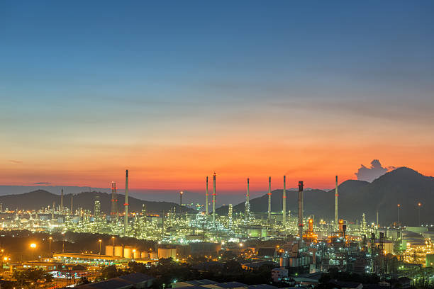 istock Twilight of oil refinery plant. 519123138