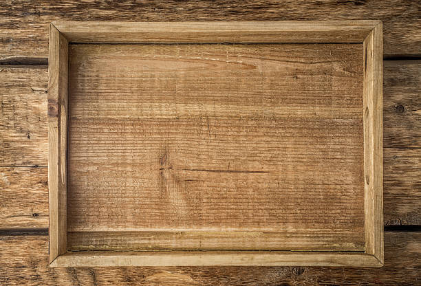 Wooden tray on the wooden table top view