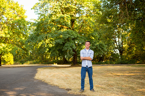 Portrait of a young man who is a high school senior in Oregon.