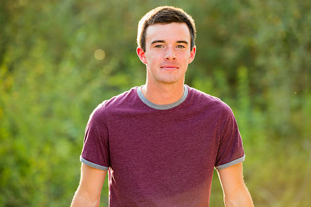 istock Young Man High School Senior Portrait 519125546