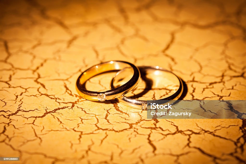 Wedding rings on a yellow background Beautiful People Stock Photo