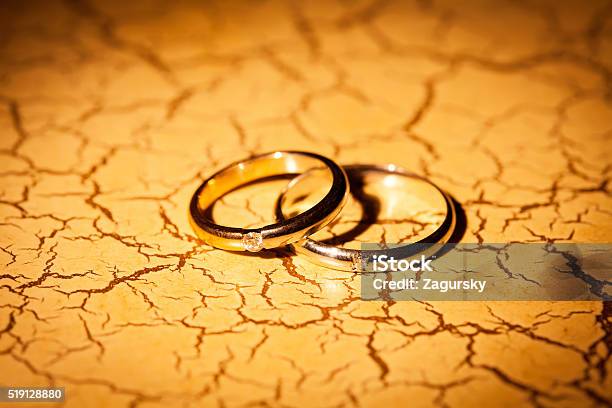 Wedding Rings On A Yellow Background Stock Photo - Download Image Now - Beautiful People, Beauty, Bride