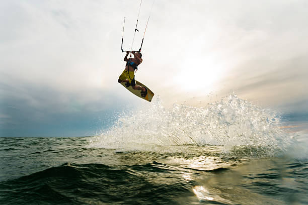 istock Surfer jumping at the sunset 519128922