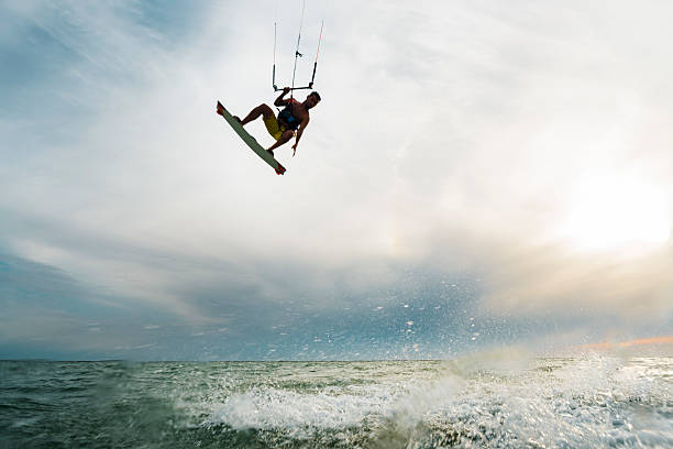 istock Surfer jumping over the water 519128966